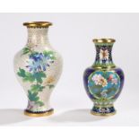 Two Chinese Peoples Republic cloisonne vases, a cream ground example with flowers, leaves and bird