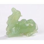 Chinese Republic green jade camel, the camel kneeling with raised head, 9cm across