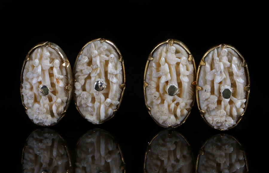 Pair of Canton ivory and gold cufflinks the ivory delicately carved with figures in a landscape.