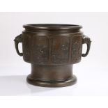 19th Century Chinese bronze censer, with elephant mask handles and eight panels around the side