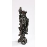 Republic of China era hardwood lamp carved as a figure of a boy holding a ruyi sceptre and fruits