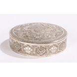 Indian silver box, the domed top heavily decorated with flowers and scrolls with a conforming