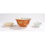 Three Chinese dishes to include a small Dingyao exterior moulded saucer dish possibly Jin dynasty,