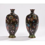 Pair of Chinese cloisonne vases, decorated with circular floating panels with various colours and