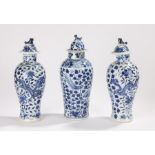 Three Chinese late Ch'ing baluster shape lidded vases two decorated with dragons and another with