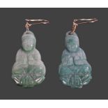 Pair of jade earrings, each carved as Buddha with a yellow metal loop, 37mm high