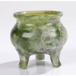 Chinese jade censer, green and grey with an arched lip and round body raised on arched legs, 6.5cm