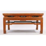 Chinese low centre table, the square top above a carved fret frieze and shaped stretchers uniting