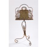 Benson taste magazine rack, with arched top above the rack and arched base with scroll feet