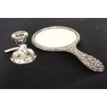 Silver handled hand mirror, squat silver candlestick (2)