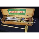 Jaques croquet set, housed in a pine box, together with a spare croquet mallet