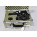 Konica FP1 camera body, Tamron 1:38 80-210mm tele macro lens, pentax flash, all housed in a Hakuba