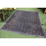 Modern needlework quilt, the navy blue ground with animal and figural decoration, 188cm x 236cm