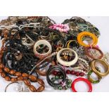 Large quantity of costume jewellery, to include necklaces, bangles, chains, bracelets etc. (qty)