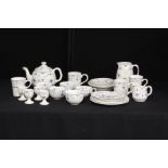 Furnivals and similar blue and white part tea service, consisting of four mugs, five teacups, four