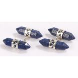 Pair of lapis lazuli cufflinks, of cylindrical form with pointed ends and white metal mounts