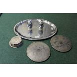 Plated ware to include two heatmaster egg coasters, two place mats, six coasters with stand, oval