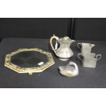 Ocatgonal bevelled wall mirror with embossed brass frame, Fenton pewter water jug, Manor pewter milk