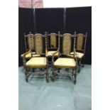 Set of five oak dining chairs, with an arched top rail above a caned back and drop in seat, (5)