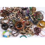 Large quantity of costume jewellery, to include necklaces, bangles, chains, bracelets etc. (qty)