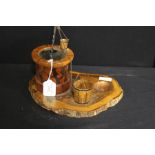 Wooden and wrought iron pipe stand, tobacco jar and match holder, in the form of a well with bucket