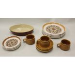 Quantity of Denby Canterbury pattern plates and side plates together with some stoneware cups and