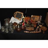 Decorative objects to include masks, boomerangs, carvings, pewter tankards, etc. (qty)