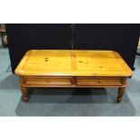 Mahogany coffee table. with two frieze drawers, on turned legs, 125cm x 68cm