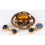 Brooch, set with a glass stone, together with a pair of cufflinks