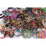 Large quantity of costume jewellery, to include necklaces, bangles, chains, bracelets etc. (qty)