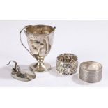 Silver, various dates and makers, to include two napkin rings, trophy cup, mustard pot lid, 4.2oz (