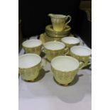 Hamilton fine bone china tea service, the ivory coloured ground with gilt leaf decoration, place
