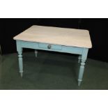 Pine dining table, with white painted top on a turquoise painted base with frieze drawer and