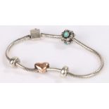 Clogau silver bracelet with four charms