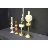 Oil lamp with frosted glass shade and reeded brass stem, red glass oil lamp, oil lamp with fleur