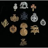 British Army cap badges from different periods, Army Pay Corps, Royal Engineers, Royal Scots