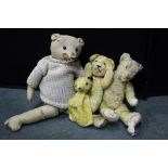 Three late 19th/early 20th century teddy bears, sooty puppet (4)