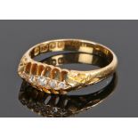 18 carat gold diamond set ring, with a row of five round cut diamonds, ring size L