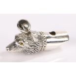 Silver whistle in the form of a dog head