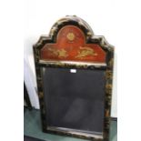 Chinoiserie wall mirror, the arched red and black top section with depictions of dragons, pagodas