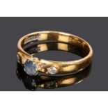 22 carat gold sapphire and diamond set ring, the central sapphire with a round cut diamond to either