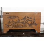 Oriental carved coffer/blanket box, the rectangular lid carved with an oriental scene with a