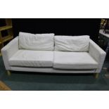 Ikea three seater settee, upholstered in an off-white fabric