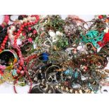 Large quantity of costume jewellery, to include necklaces, bangles, chains, bracelets etc. (qty)