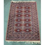 Lursitan Middle Eastern wool carpet, the brick red ground with lozenge pattern centre, multiple