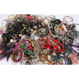 Large quantity of costume jewellery, to include necklaces, bangles, chains, bracelets etc. (qty)