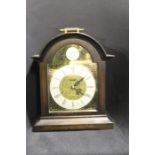 Mauthe Germany mahogany cased mantel clock, the arched brass dial with silvered chapter ring and
