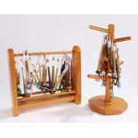 Collection of bobbins, on two racks, (qty)