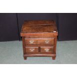 Georgian style oak cellarette, with hinged lid and simulated drawers to three sides, on block