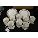 Paragon Belinda part tea service, with foliate decoration, consisting of eight cups, seven